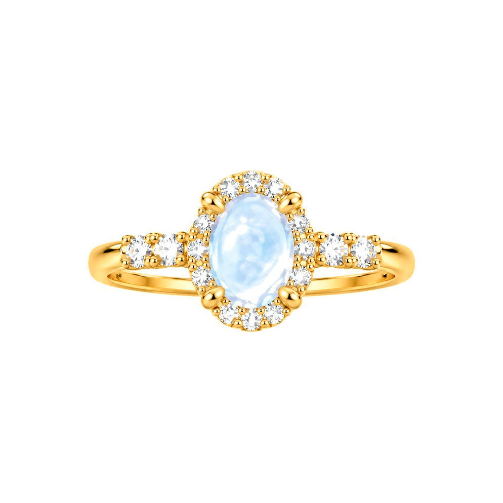 Anillo de Matrimonio para Dama Oro 10k Piedra Ovalada Azul con Halo de Circonias