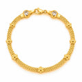 Brazalete Oro 10k Malla con Flores y Circonios