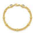 Brazalete Oro 10k Malla con Flores y Circonios