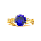 Anillo de Dama Oro 10k Solitario Azul con Banda Entrelazada