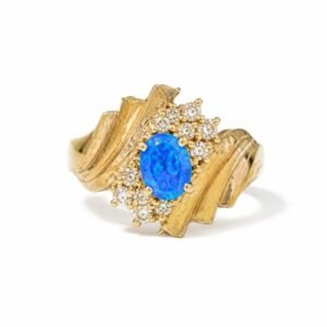 Anillo de Oro 10k con Ópalo Azul y Piedras Circonia